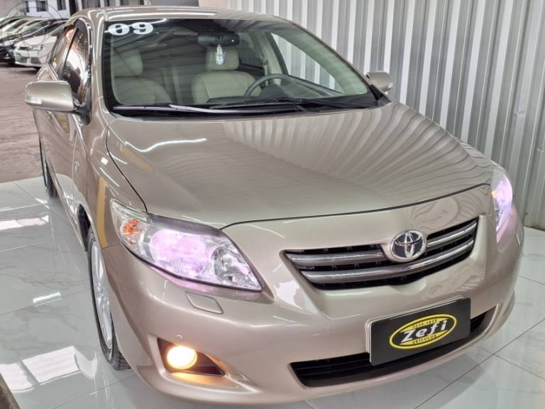TOYOTA - COROLLA 1.8 SE-G 16V FLEX 4P AUTOMÁTICO - 2008/2009 - BEGE - R$ 58.900,00