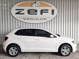 VOLKSWAGEN - POLO 1.0MPI TOTAL FLEX MANUAL - 2020/2021 - BRANCA - R$ 69.900,00