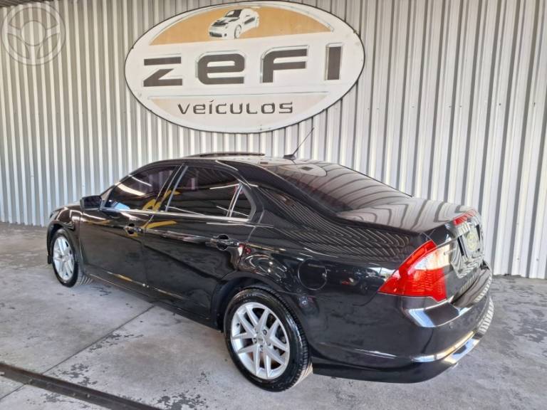 FORD - FUSION 3.0 SEL AWD V6 24V 4P AUTOMÁTICO - 2009/2010 - PRETA - R$ 53.000,00