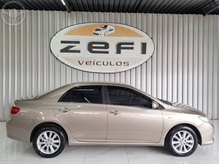 TOYOTA - COROLLA 1.8 SE-G 16V FLEX 4P AUTOMÁTICO - 2008/2009 - BEGE - R$ 58.900,00