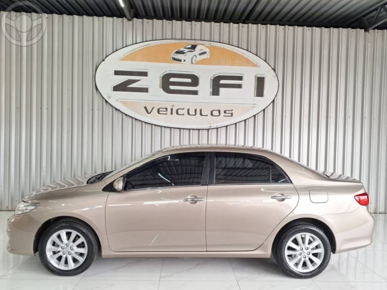 TOYOTA - COROLLA 1.8 SE-G 16V FLEX 4P AUTOMÁTICO - 2008/2009 - BEGE - R$ 58.900,00
