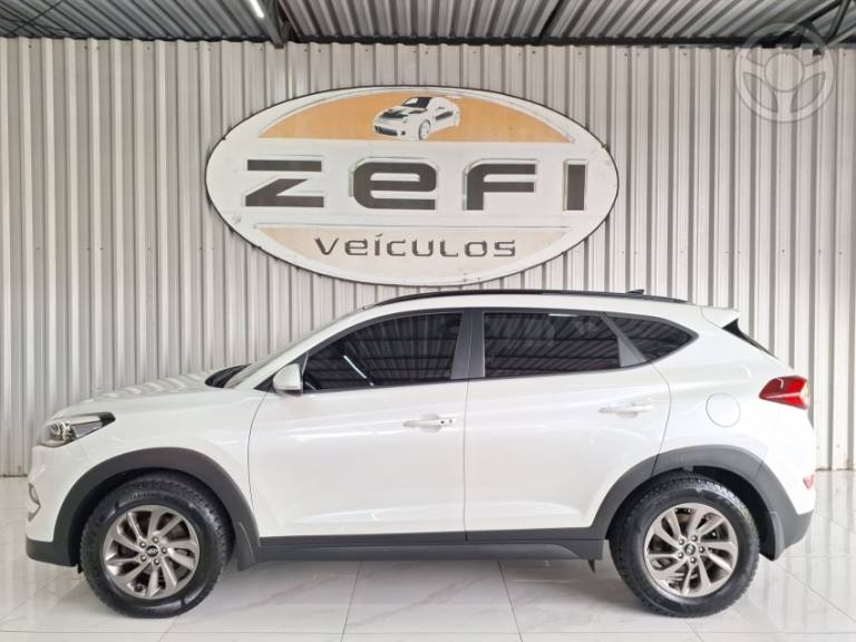 HYUNDAI - TUCSON 1.6 16V T-GDI GLS ECOSHIFT - 2017/2018 - BRANCA - R$ 99.900,00